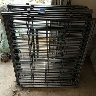 Metal kennel panels and bundled rods - Image 1 of 5