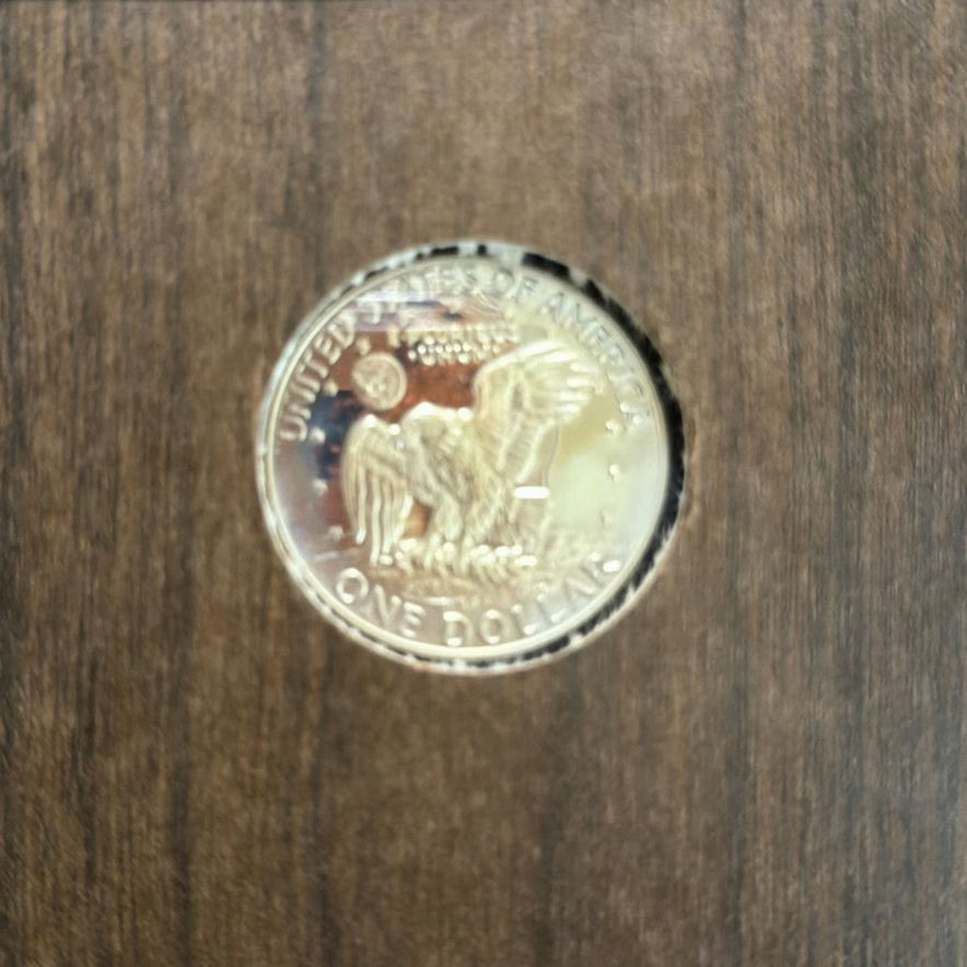 2 Eisenhower dollar coins in display boxes - image 6 of 6