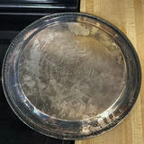 Round engraved metal tray and three-lobed shell-shaped serving platter - thumbnail 2 of 4