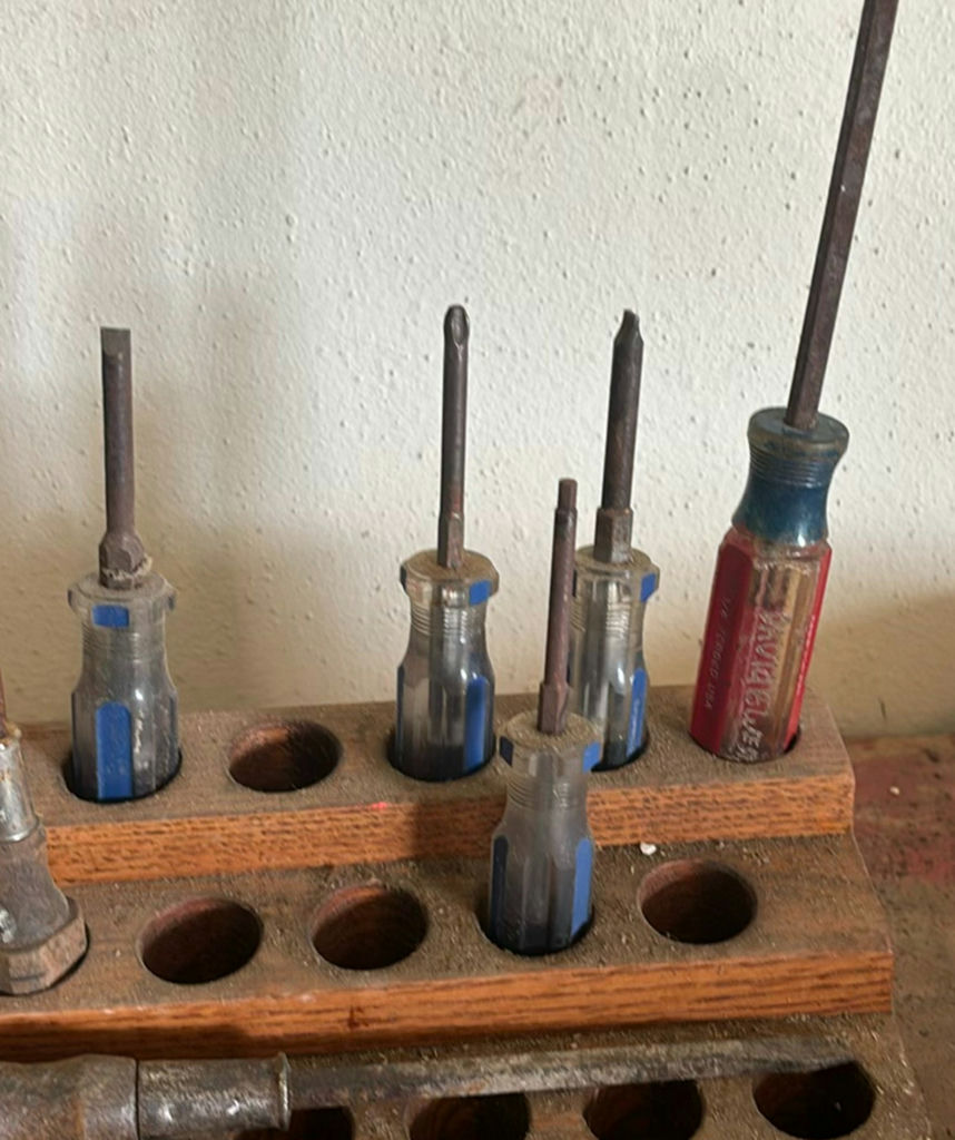 Assorted hand tools and screwdrivers in wooden rack - image 7 of 8
