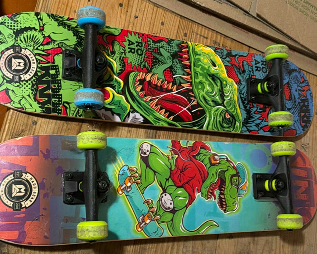 2 Madd Gear skateboards with monster and dinosaur graphics - image 4 of 9