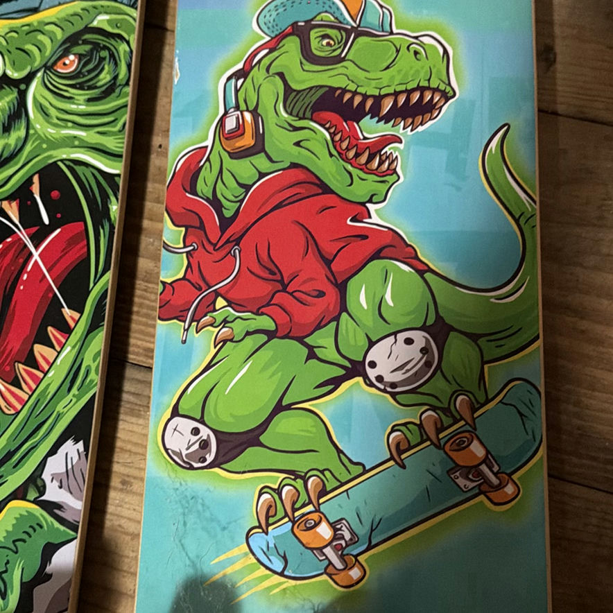 2 Madd Gear skateboards with monster and dinosaur graphics - image 6 of 9