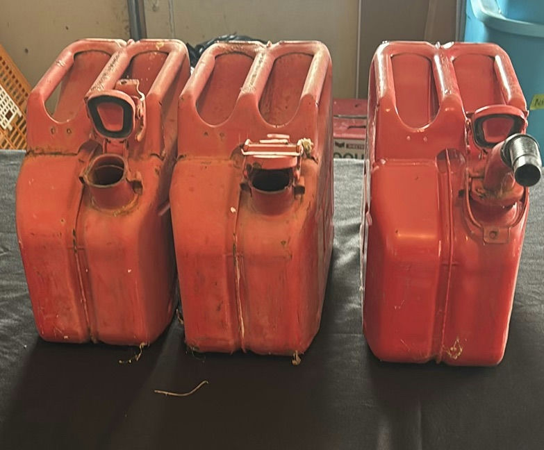 Three Metal plastic gas cans - image 1 of 8