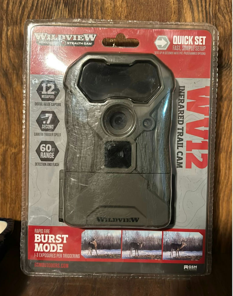 Wildlife trail cameras and timer accessories in boxes - image 5 of 6