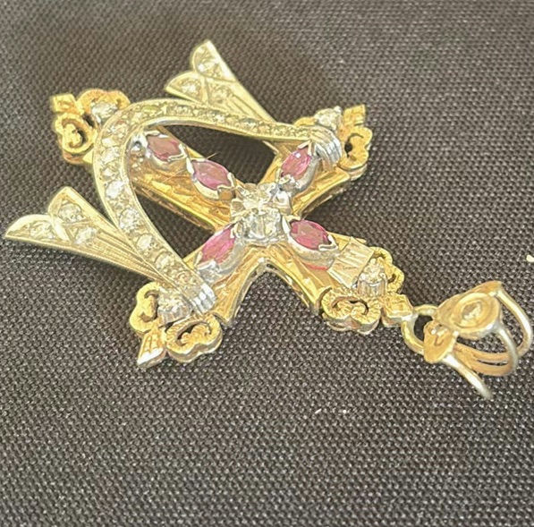 Ornate gold-tone cross pendant with pink stones - image 4 of 4