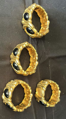 Set of five gold-tone textured bracelets with black stones - Image 1 of 3
