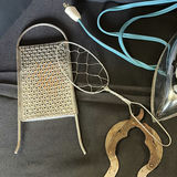 Assorted vintage metal kitchen tools and an electric iron - thumbnail 4 of 6
