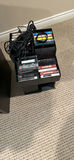 Home entertainment electronics stack with VHS tapes and vinyl - thumbnail 1 of 6