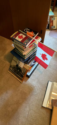 Stack of Canadian books with a flag - Image 1 of 3