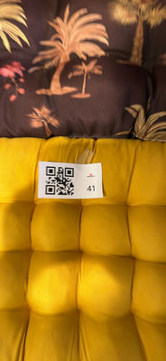 Decorative palm-themed hand fan, cushions, bench, and wicker basket - Image 1 of 5