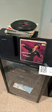 Home entertainment electronics stack with VHS tapes and vinyl - thumbnail 6 of 6