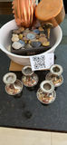 Copper decorative vessels with stone-filled bowl and silver candle holders - thumbnail 1 of 2