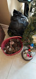 Assorted Christmas decorations: artificial evergreen tree with burlap ribbon, pinecones, poinsettia, nativity display, and cone sculptures - thumbnail 2 of 5