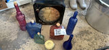 Assorted colored glass bottles and a clock - thumbnail 5 of 6