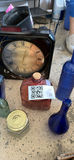 Assorted colored glass bottles and a clock - thumbnail 2 of 6