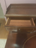 Antique mahogany desk with circular leather-inlaid top and built-in hutch - thumbnail 2 of 8