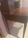 Antique mahogany desk with circular leather-inlaid top and built-in hutch - thumbnail 4 of 8
