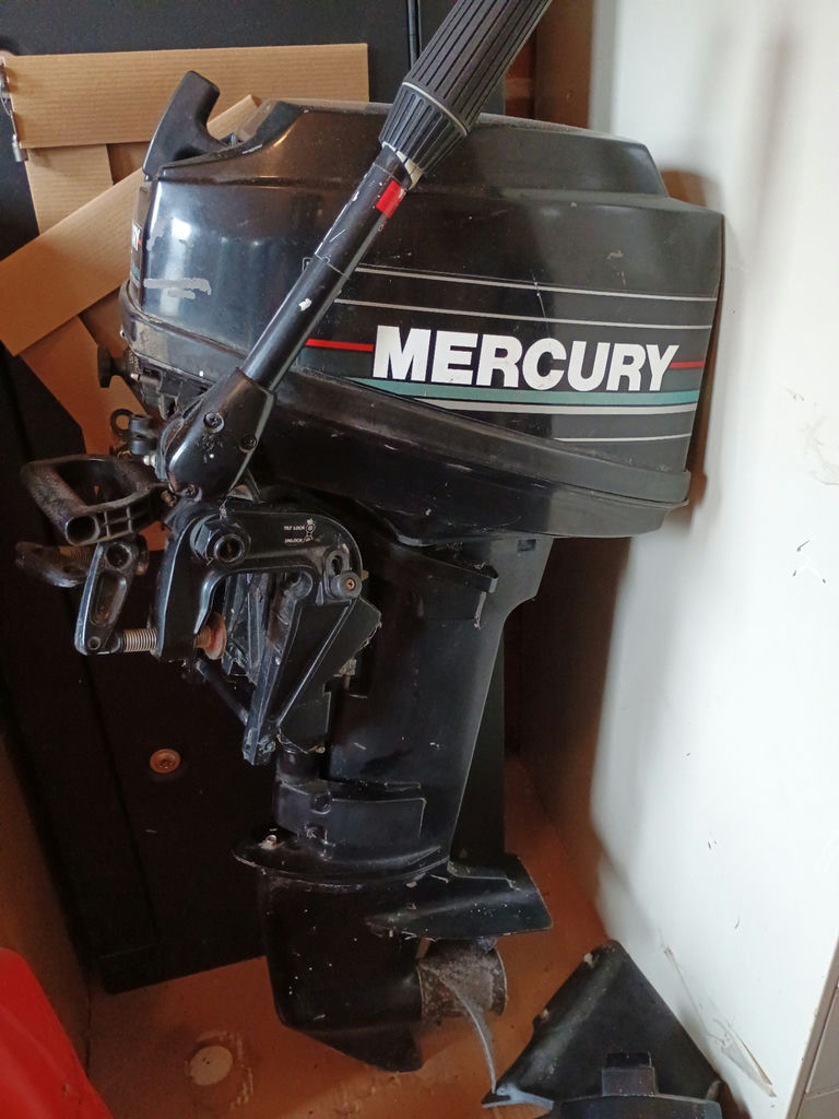 Mercury outboard motor with gas can and battery - image 3 of 4