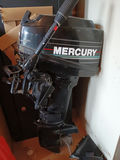 Mercury outboard motor with gas can and battery - thumbnail 3 of 4