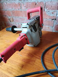 Milwaukee Hole Hawg electric drill with safety helmet - thumbnail 3 of 4