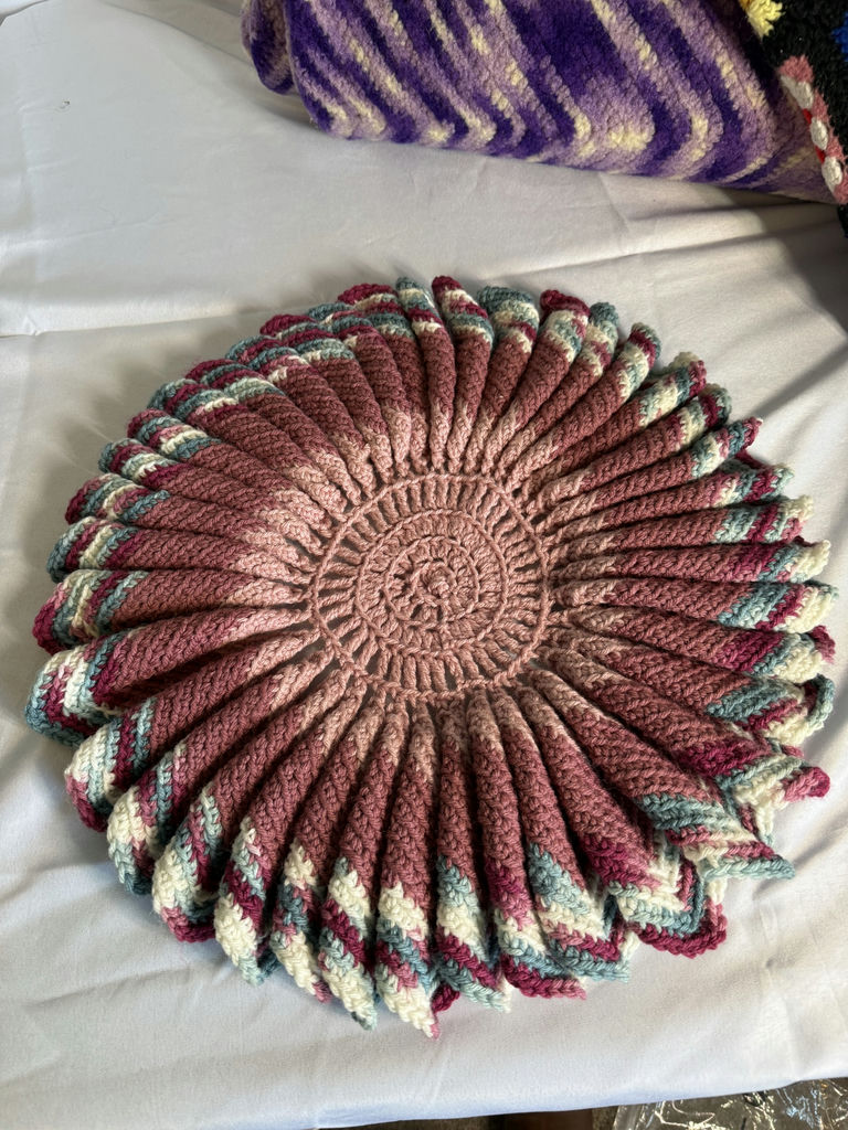 Crocheted blankets and a round pillow - image 2 of 4