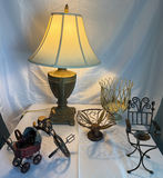 Vintage table lamp with assorted decorative metal items - thumbnail 1 of 5