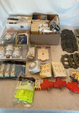 Assorted lighting bulbs, electrical outlets, switch plates, extended light bulb changer - thumbnail 1 of 7