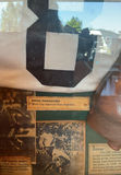 Sports memorabilia collection: baseball gear and soccer display - thumbnail 2 of 6