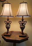 Octagonal pedestal side table with two ornate lamps - thumbnail 1 of 4