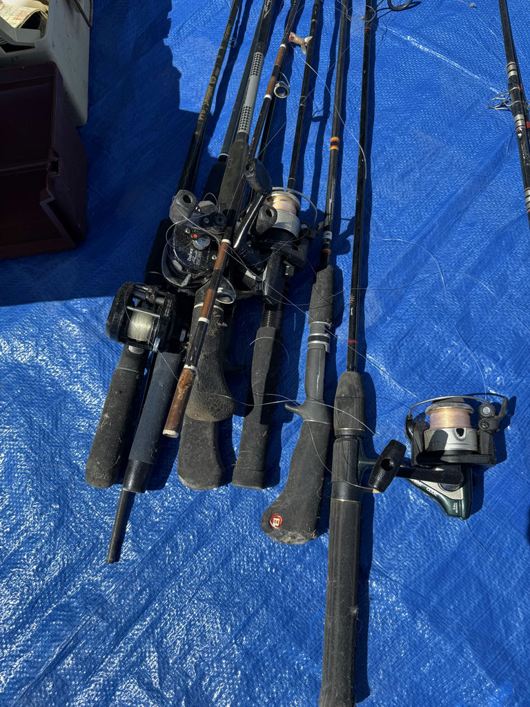 Collection of fishing rods, reels, and tackle - image 14 of 14