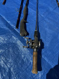 Collection of fishing rods, reels, and tackle - thumbnail 13 of 14