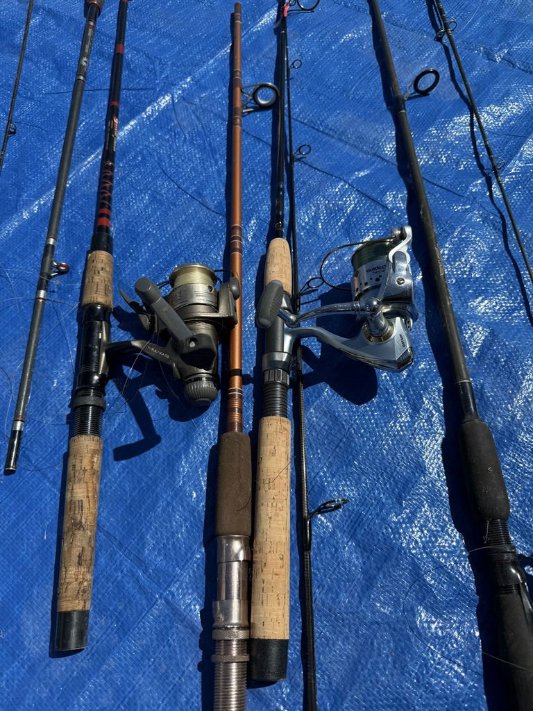 Collection of fishing rods, reels, and tackle - image 11 of 14