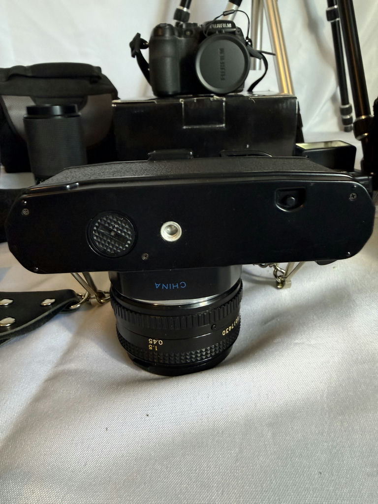 Assorted cameras, lenses, flash, and tripods - image 5 of 16