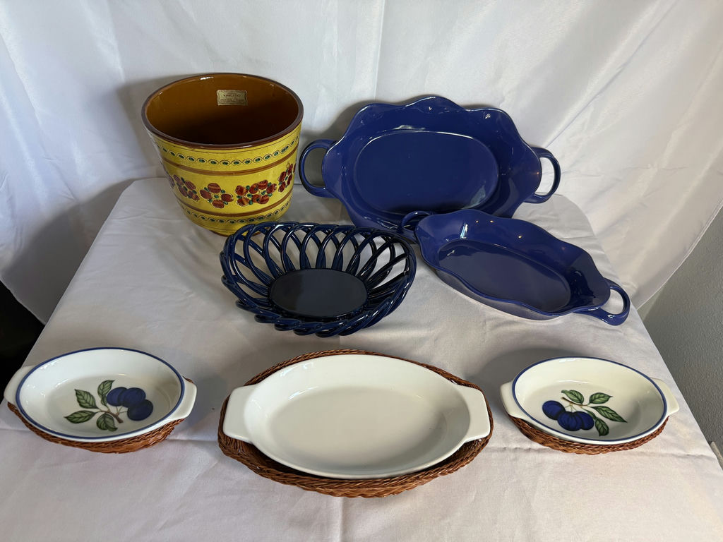Blue ceramic bakeware set with yellow floral planter and cherry-pattern dishware - image 1 of 7