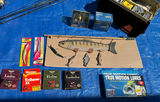 Collection of fishing rods, reels, and tackle - thumbnail 8 of 14