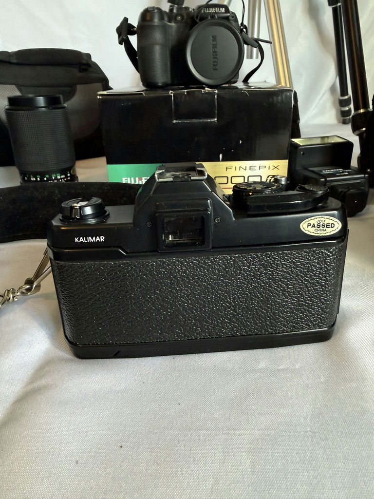 Assorted cameras, lenses, flash, and tripods - image 4 of 16