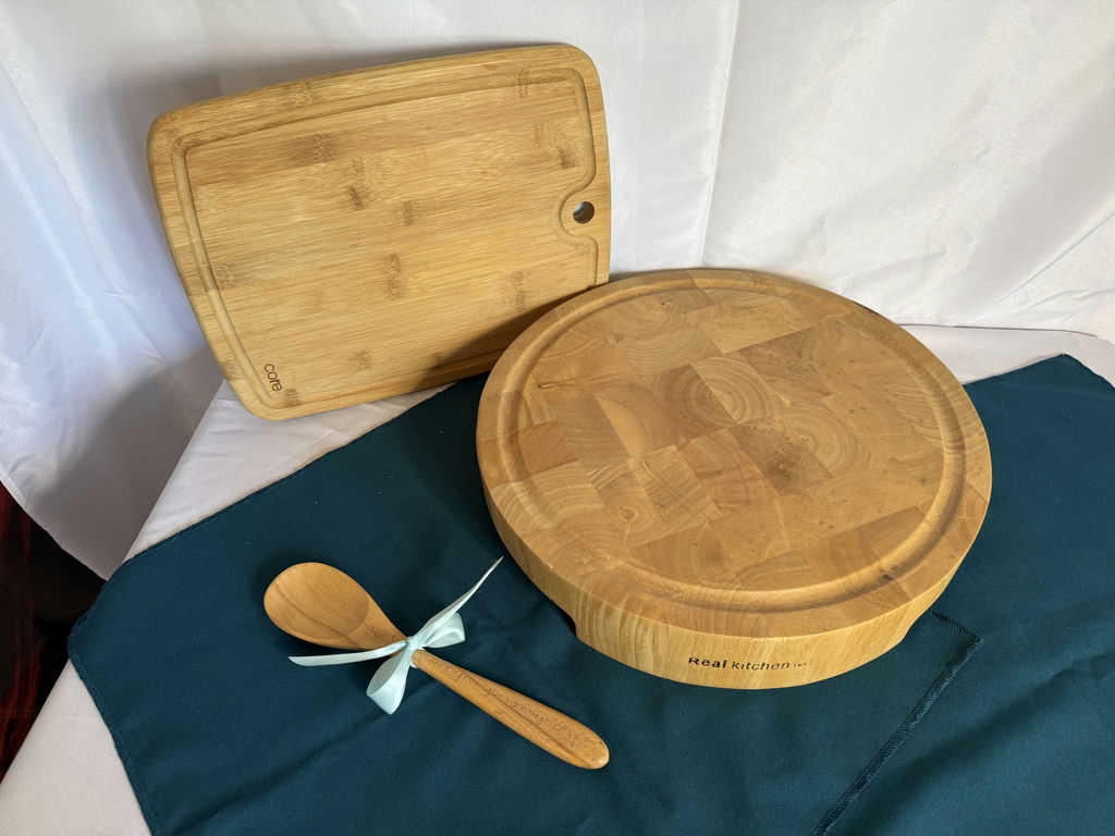 Wooden cutting boards, spoon, and ornate serving tray with cheese knife - image 2 of 3