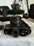 Assorted cameras, lenses, flash, and tripods - thumbnail 6 of 16