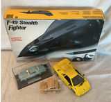 F-19 Stealth Fighter model kit with Buick Riviera diecast and wooden wagon - thumbnail 1 of 4