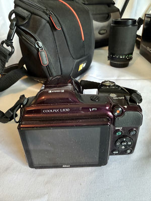 Assorted cameras, lenses, flash, and tripods - Image 1 of 16