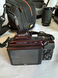Assorted cameras, lenses, flash, and tripods - thumbnail 1 of 16