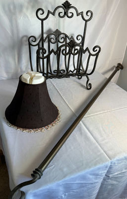 Ornate black iron magazine rack, decorative lampshade, and curved curtain rod - Image 1 of 4