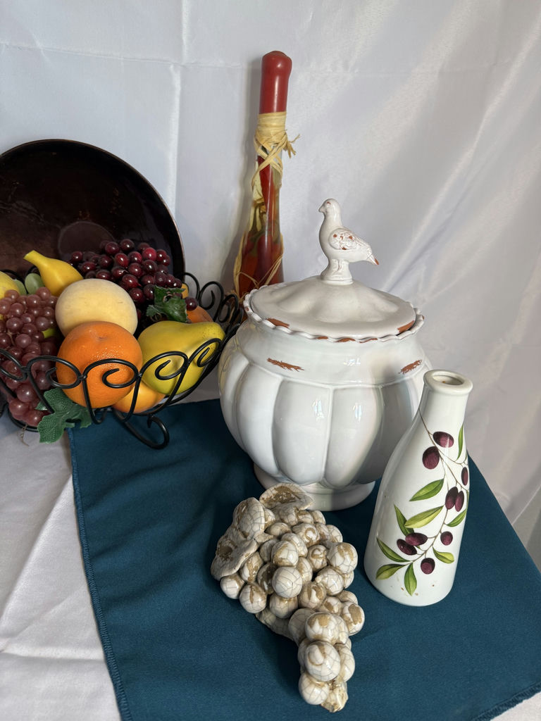 Still-life arrangement with ceramic tureen, fruit basket, and decorative bottles - image 3 of 4