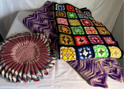 Crocheted blankets and a round pillow - Image 1 of 4