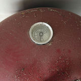 Red barrel-style smoker with wood chunks - thumbnail 3 of 5