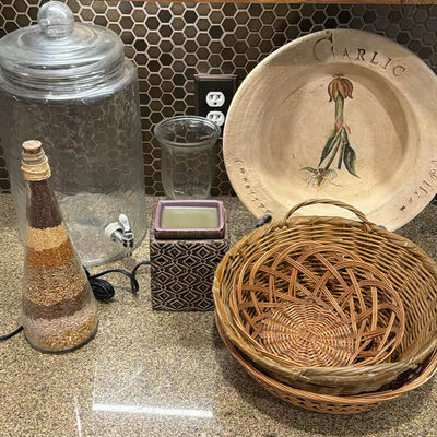 Glass dispenser, seed bottle, planter, baskets, plate, and jars - Image 1 of 6