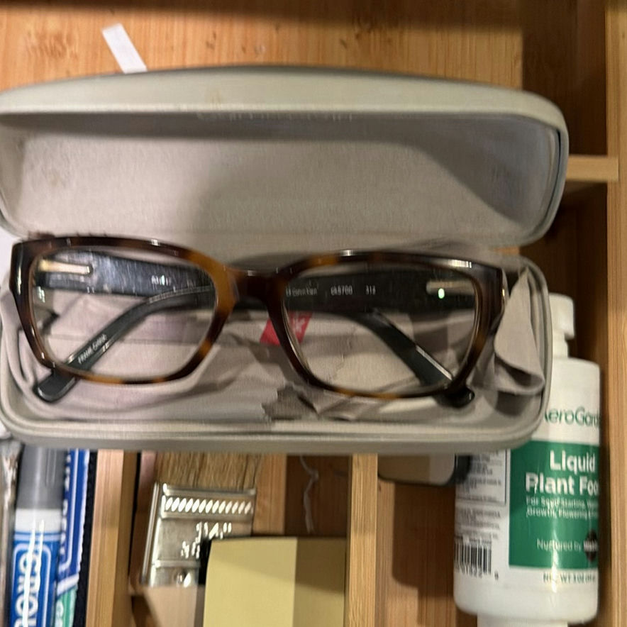 Assorted tools, adhesives, and maintenance supplies in a wooden organizer - image 5 of 5