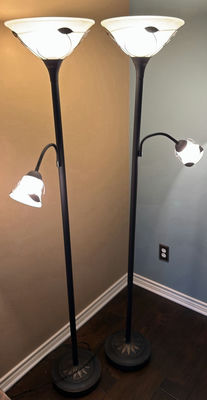 Pair of black floor lamps with dual light heads - Image 1 of 6
