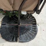 Beige folded patio umbrella with blue interior canopy on round base - thumbnail 4 of 5