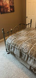 Ornate metal bed frame with quilted bedding - thumbnail 3 of 6